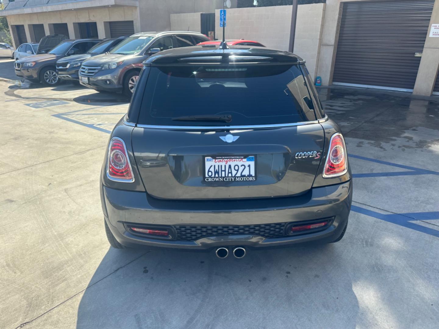 2012 Black /Black Mini Cooper Cloth (WMWSV3C52CT) with an 4Cylinder engine, Manual transmission, located at 30 S. Berkeley Avenue, Pasadena, CA, 91107, (626) 248-7567, 34.145447, -118.109398 - Tank : 13.20 Anti-Brake System : 4-Wheel ABS Steering Type : Rack and Pinion Front Brake Type : Disc Rear Brake Type : Disc Turning Diameter : 35.10 Front Suspension : Ind Rear Suspension : Ind Front Spring Type : Coil Rear Spring Type : Coil Tires : 195/55R16 Front Headroom : 38.80 Re - Photo#3